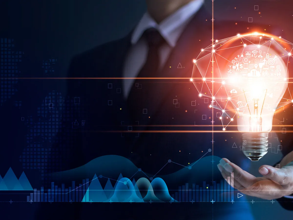 person holding lightbulb