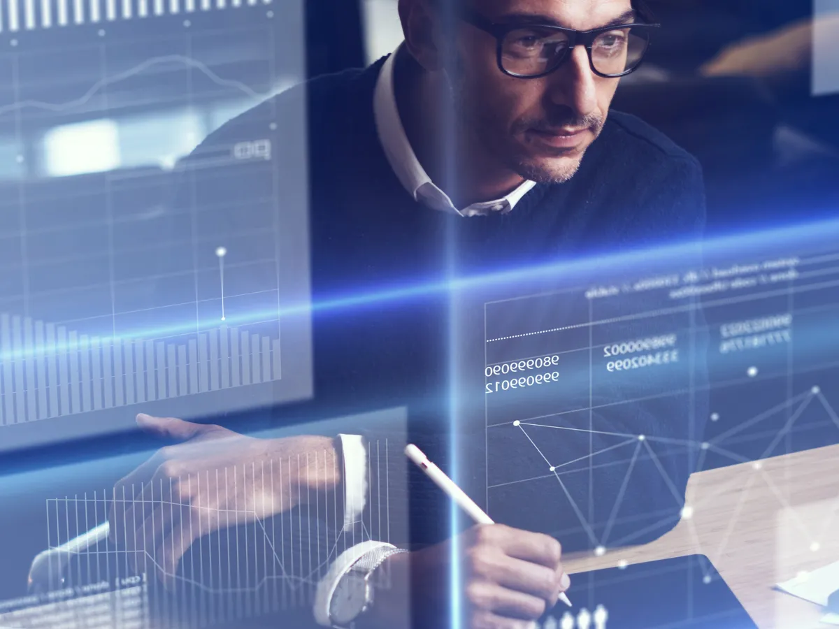 man-looking-at-data-on-a-screen