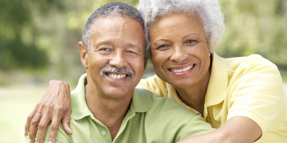 Smiling older African American couple with salt and pepper hair