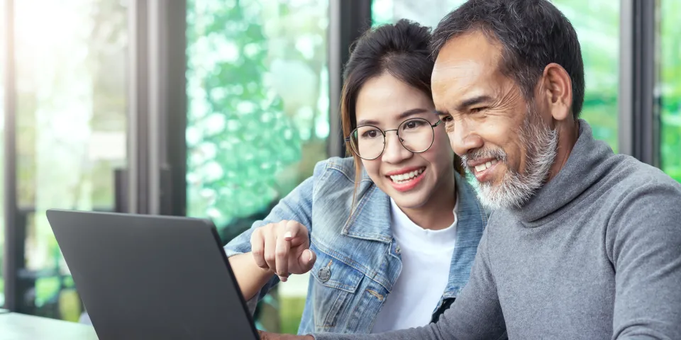 people looking at computer