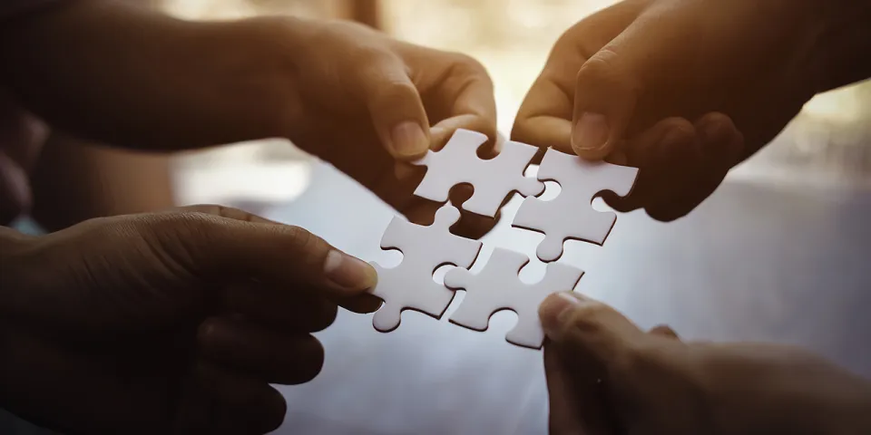 puzzle pieces fitting together